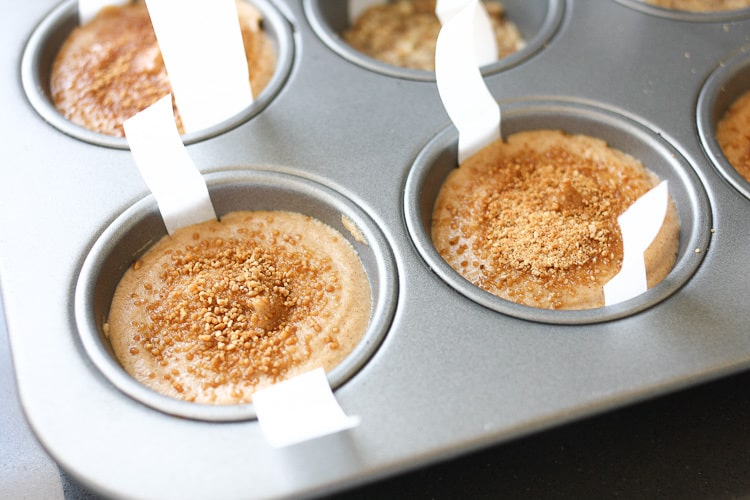 Raw vegan churro cheesecake cups in a muffin pan