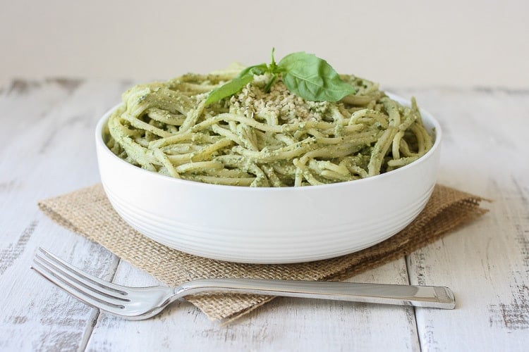 Lemon Hemp Seed Pesto and spaghetti in a white bowl