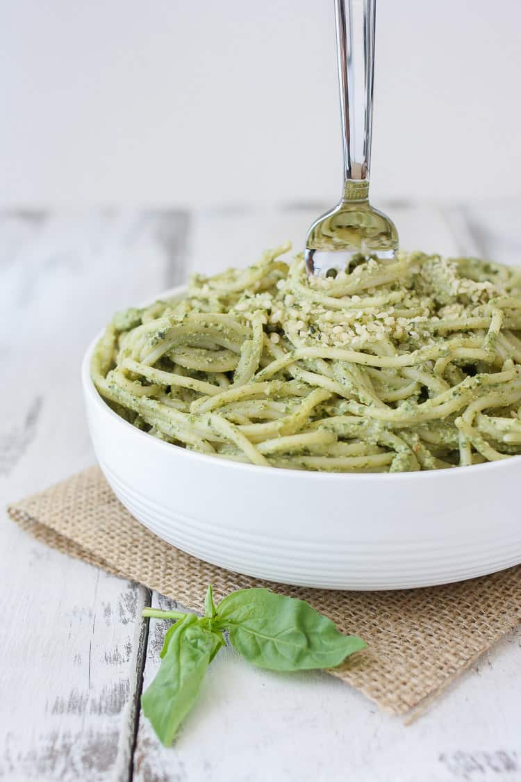 Lemon Hemp Seed Pesto and spaghetti in a bowl with a fork