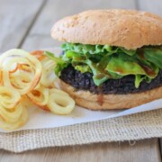 Portobello black rice burger with miso balsamic arugula