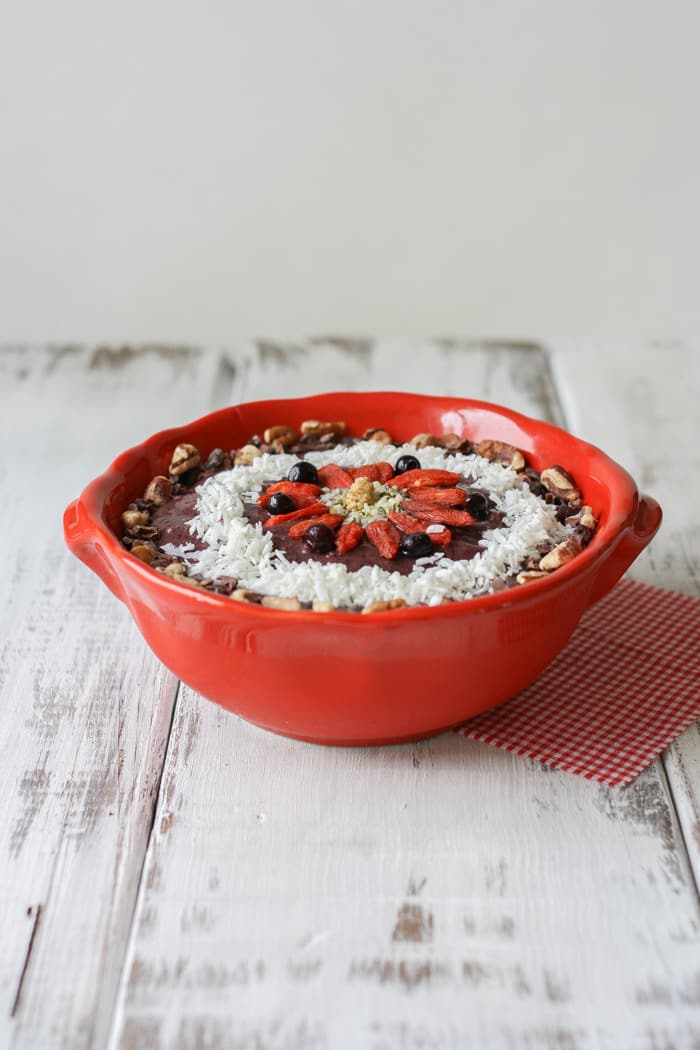 Strawberry banana blueberry spinach smoothie bowl