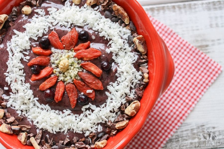 Strawberry banana blueberry spinach smoothie bowl