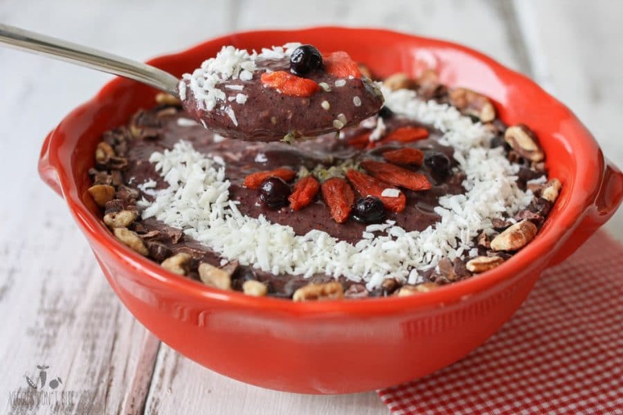 Strawberry banana blueberry spinach smoothie bowl