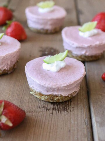 A close up of Raw strawberry margarita cheesecake cups