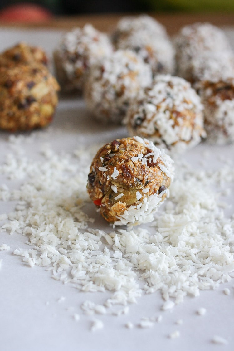 A close up of Raw superfood balls rolled in coconut