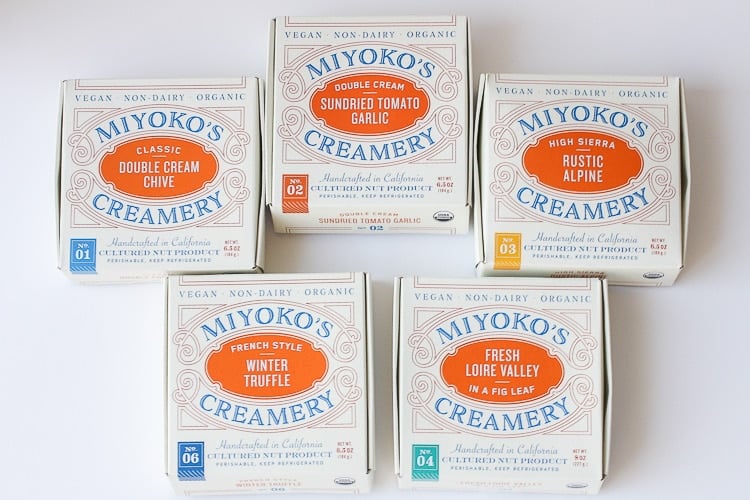 An overhead shot of 5 Miyoko's Creamery Vegan Cheeses in boxes.