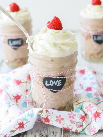 Key lime raspberry pudding parfait in glass jars