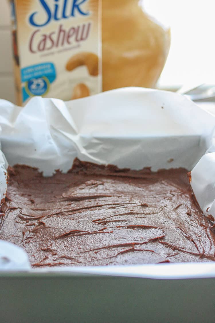 Sriracha tahini fudge in a square baking pan setting