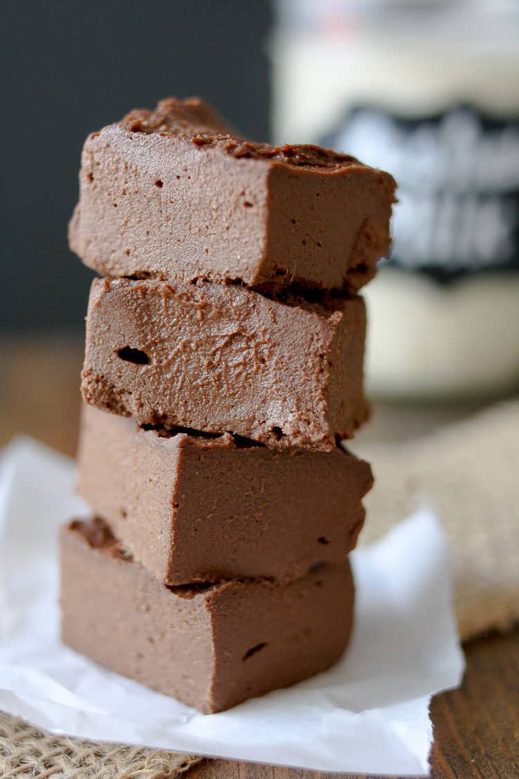 A close up of a stack of Sriracha tahini fudge 