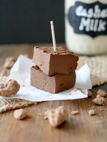 Two squares of Sriracha tahini fudge stacked on top of each other