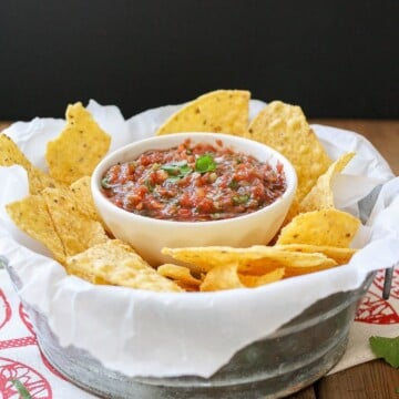 Easy fresh Mexican Salsa in a ramekin with chips beside it