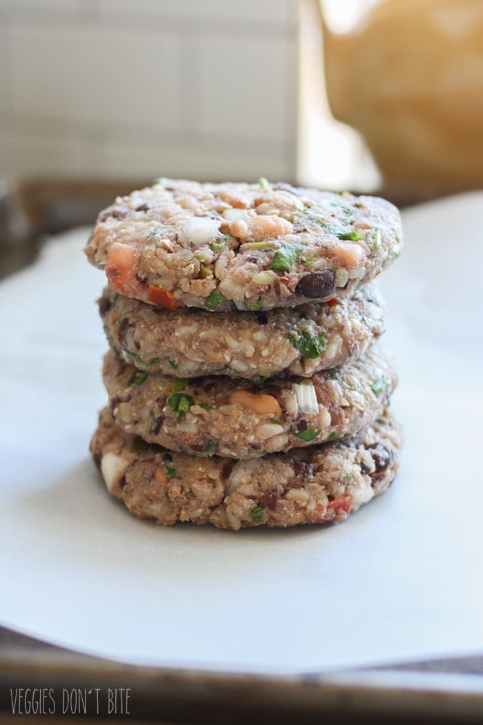 A photo of patties stacked on top of each other to make a Mexican nacho burger