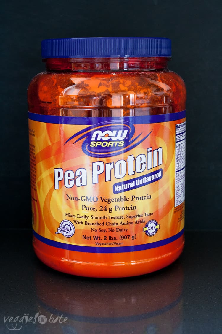 Orange container of NOW Foods unflavored pea protein powder