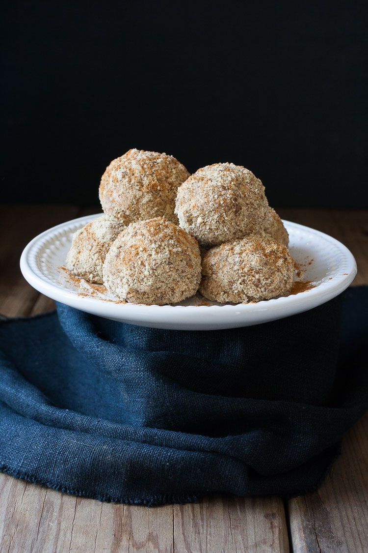 Unfried ice cream balls stacked on a plate