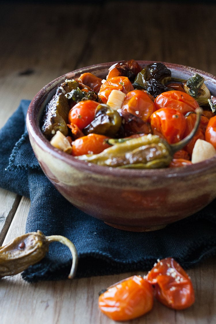 A photo of charred tomatoes and peppers in a bowl