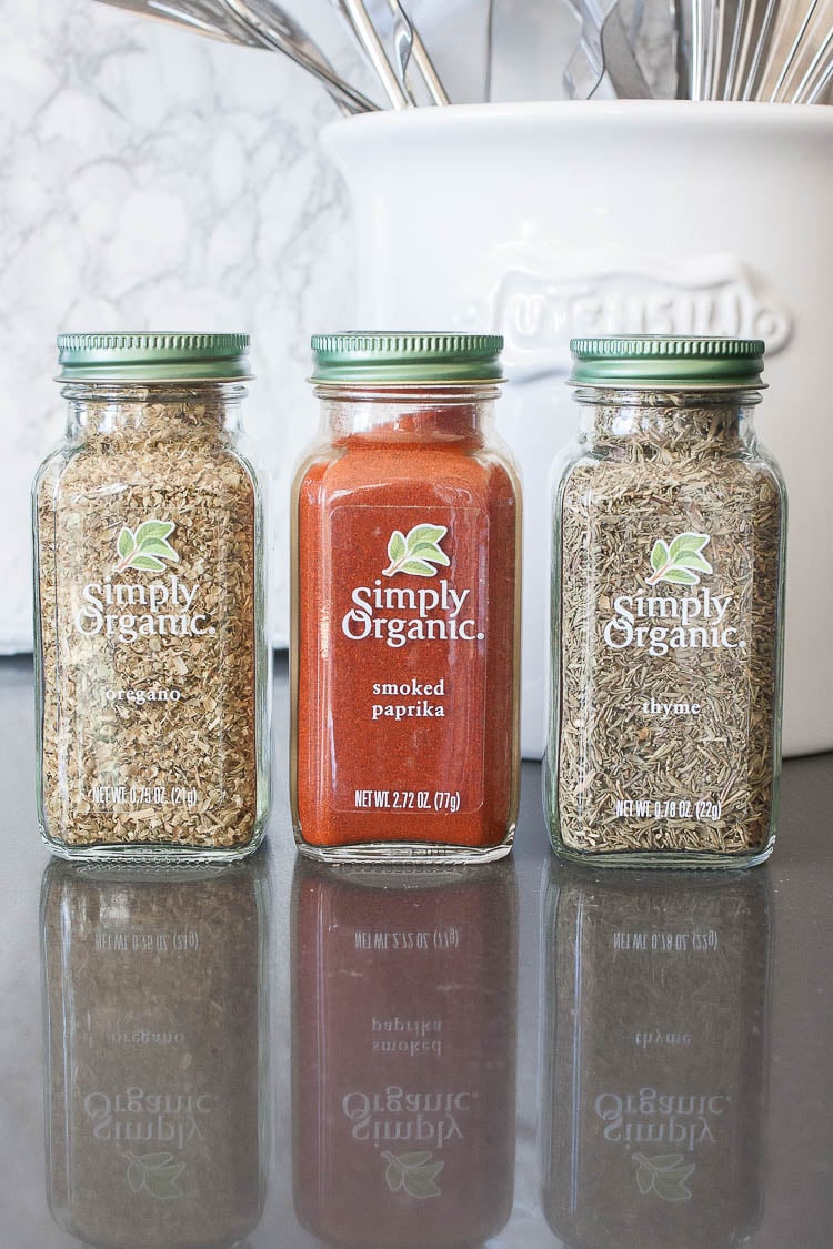 A photo of 3 spice jars sitting on a work surface for making spiced smoked tomato sauce