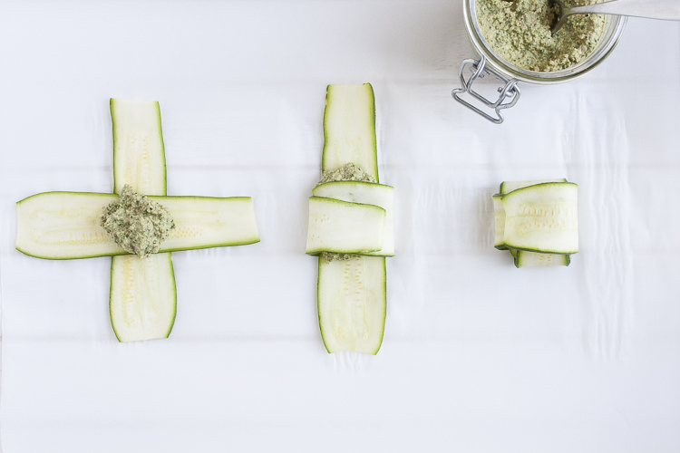 Step by step folding of zucchini ravioli filled with vegan spinach ricotta