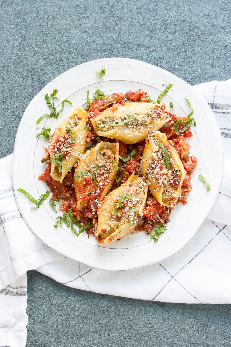 Vegan stuffed shells and cauliflower ricotta on a plate