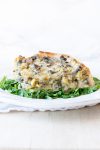 Spinach pie on a white plate