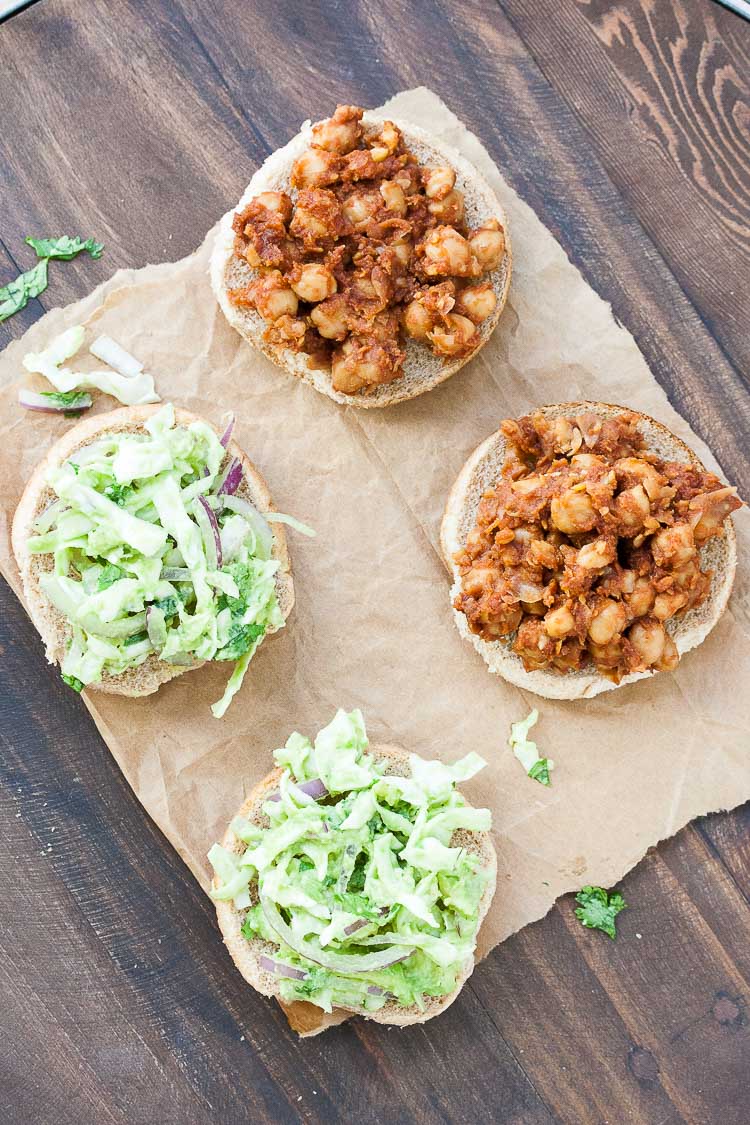 A photo two open bbq sliders sitting on a wooden surface