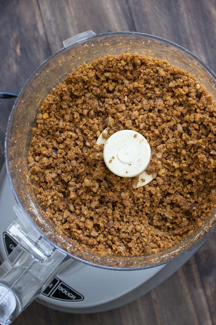 Top view of food processor with vegan taco meat crumbles