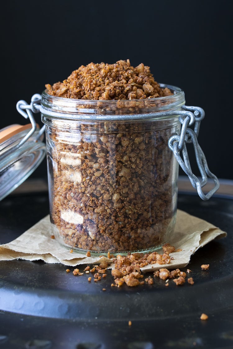 Glass jar with clamp lid filled with vegan taco meat crumbles