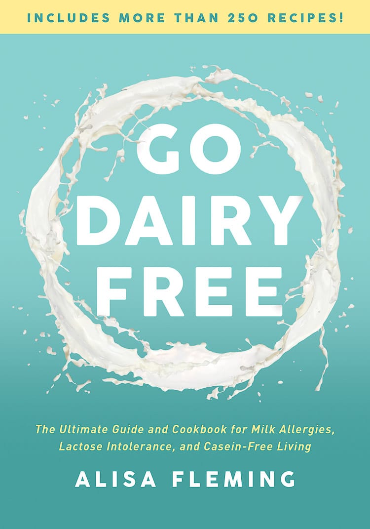 Turquoise Cover of a cookbook with white words Go Dairy Free on it