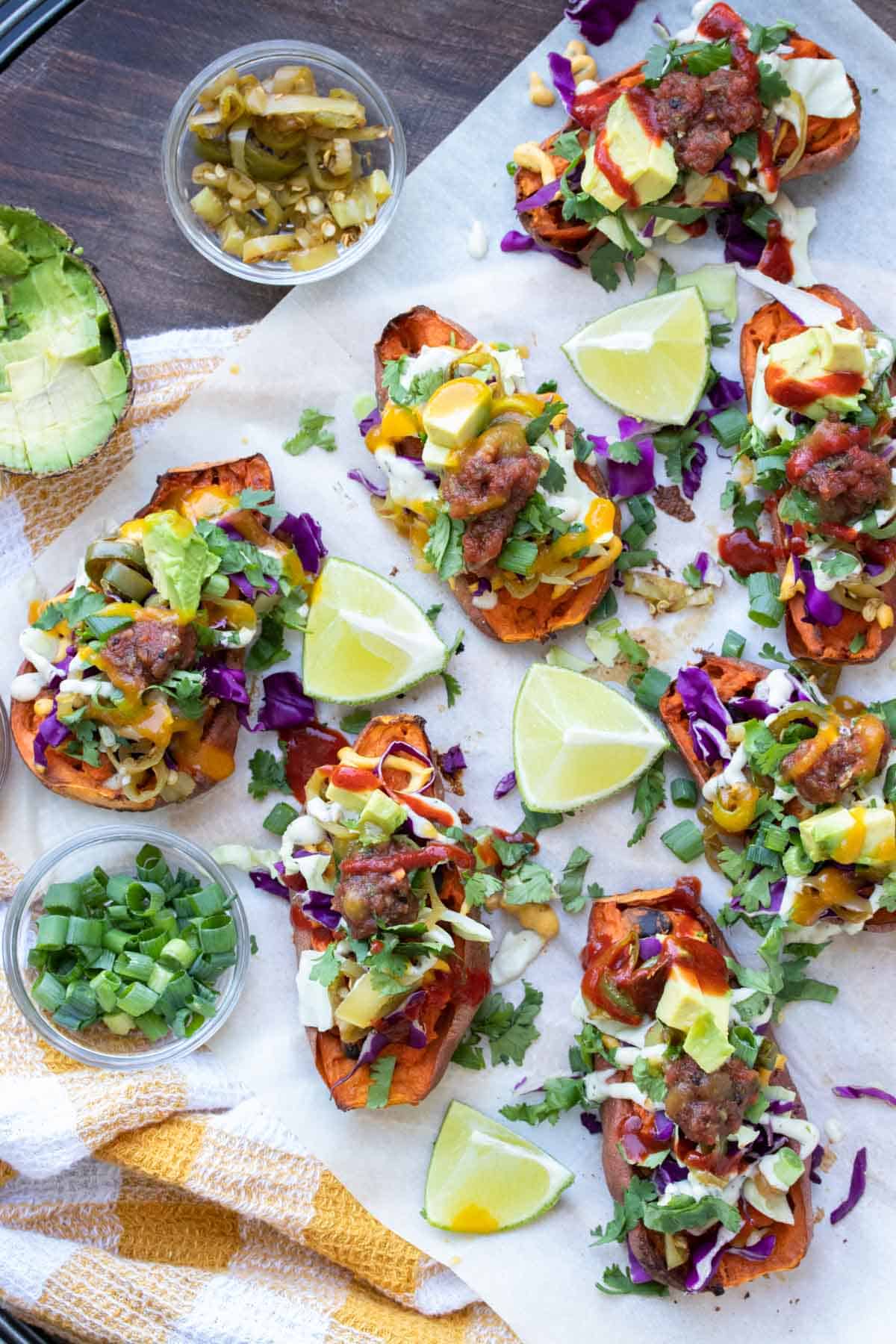 Top view of sweet potato skins fully loaded with toppings.