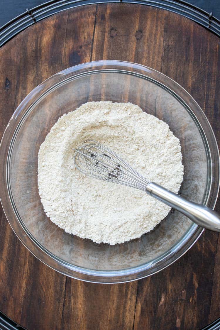 Whisk mixing flours in a glass bowl