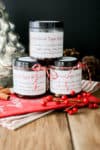 A stack of three jars of homemade brown sugar scrub