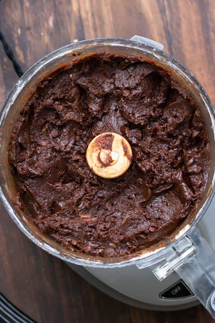 Top view of food processor with brownie batter inside