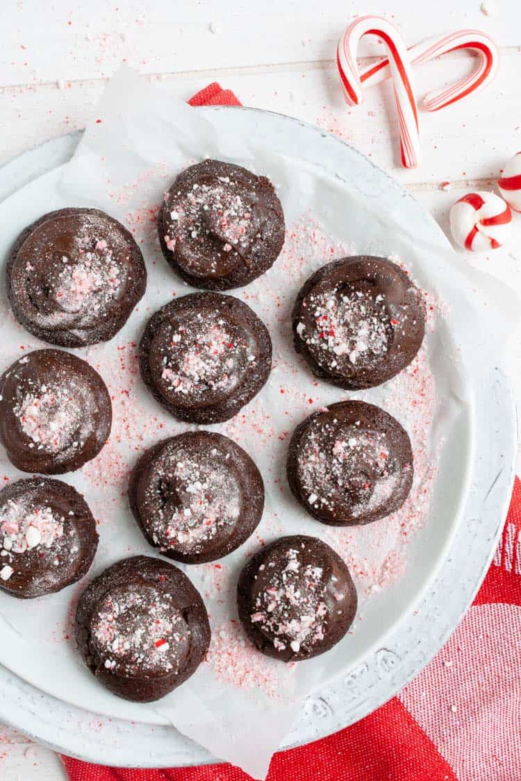 Top view of peppermint brownies on a white plate