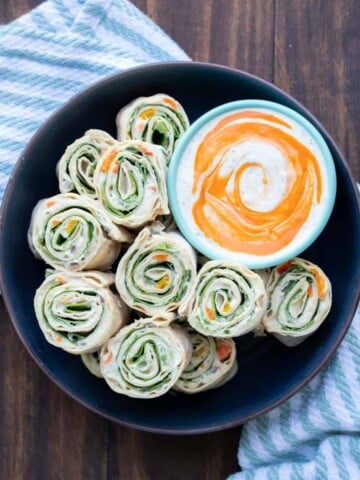 These vegan pinwheels are the perfect snack! Super kid friendly, versatile and easy enough the littles can make them too! #ad #vegansnacks #kidsrecipes