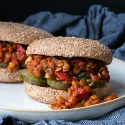 Lentil sloppy joes on a wheat bun with pickles