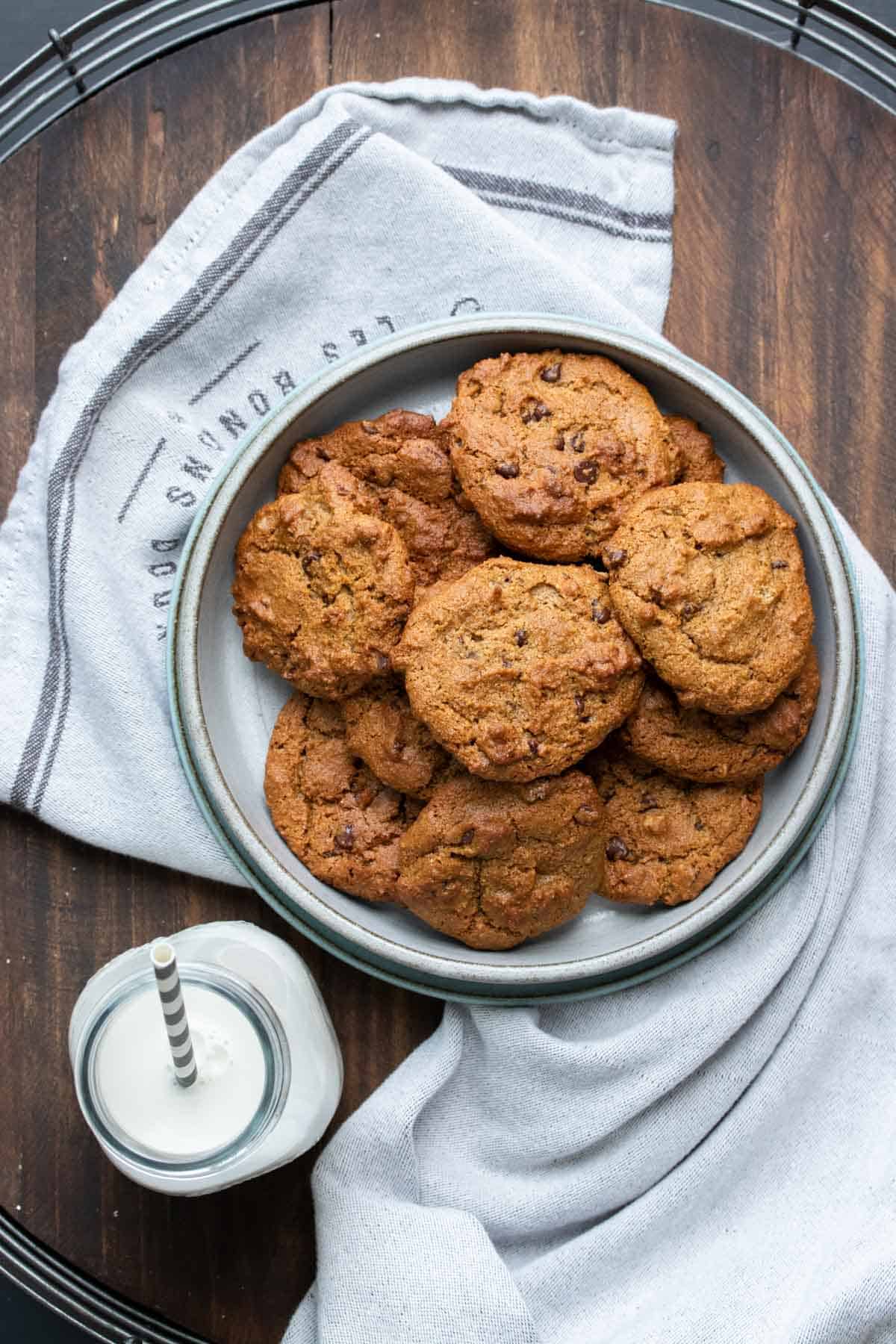 Top view of grey plate filled with baked chocolate chip cookies