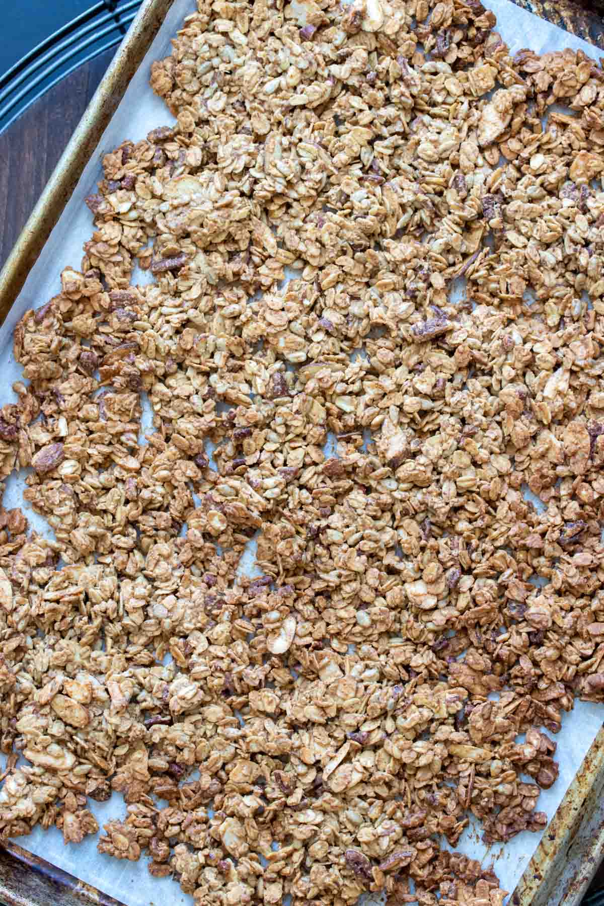 Pan of baked granola spread over it