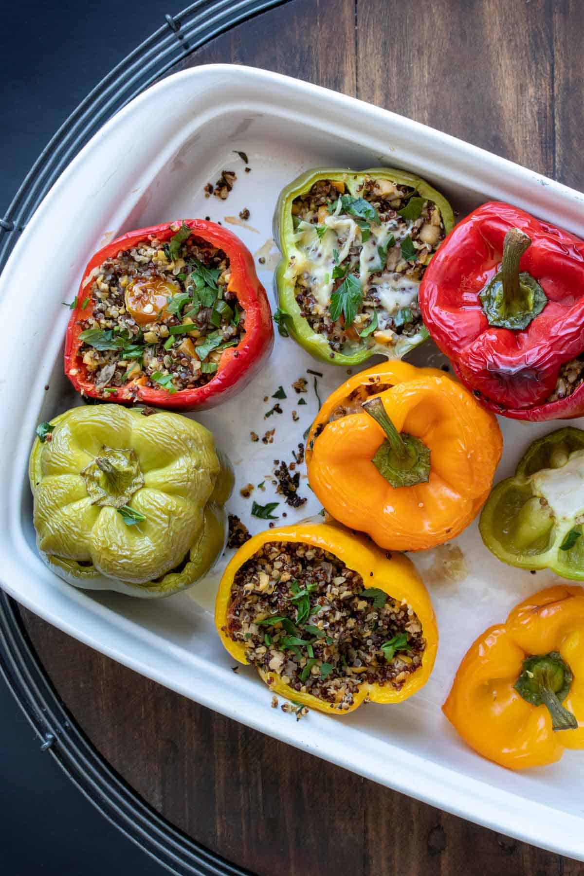 Top view of stuffed peppers in a white baking dish