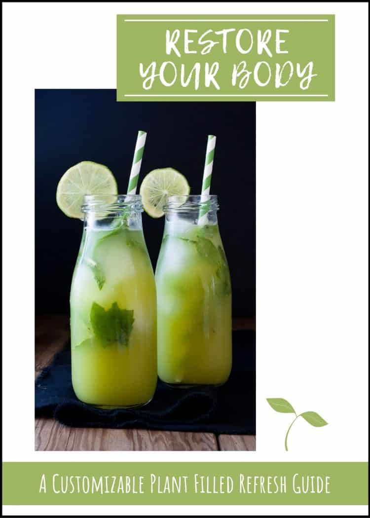 Two jars of green juice on a black napkin with text overlayy