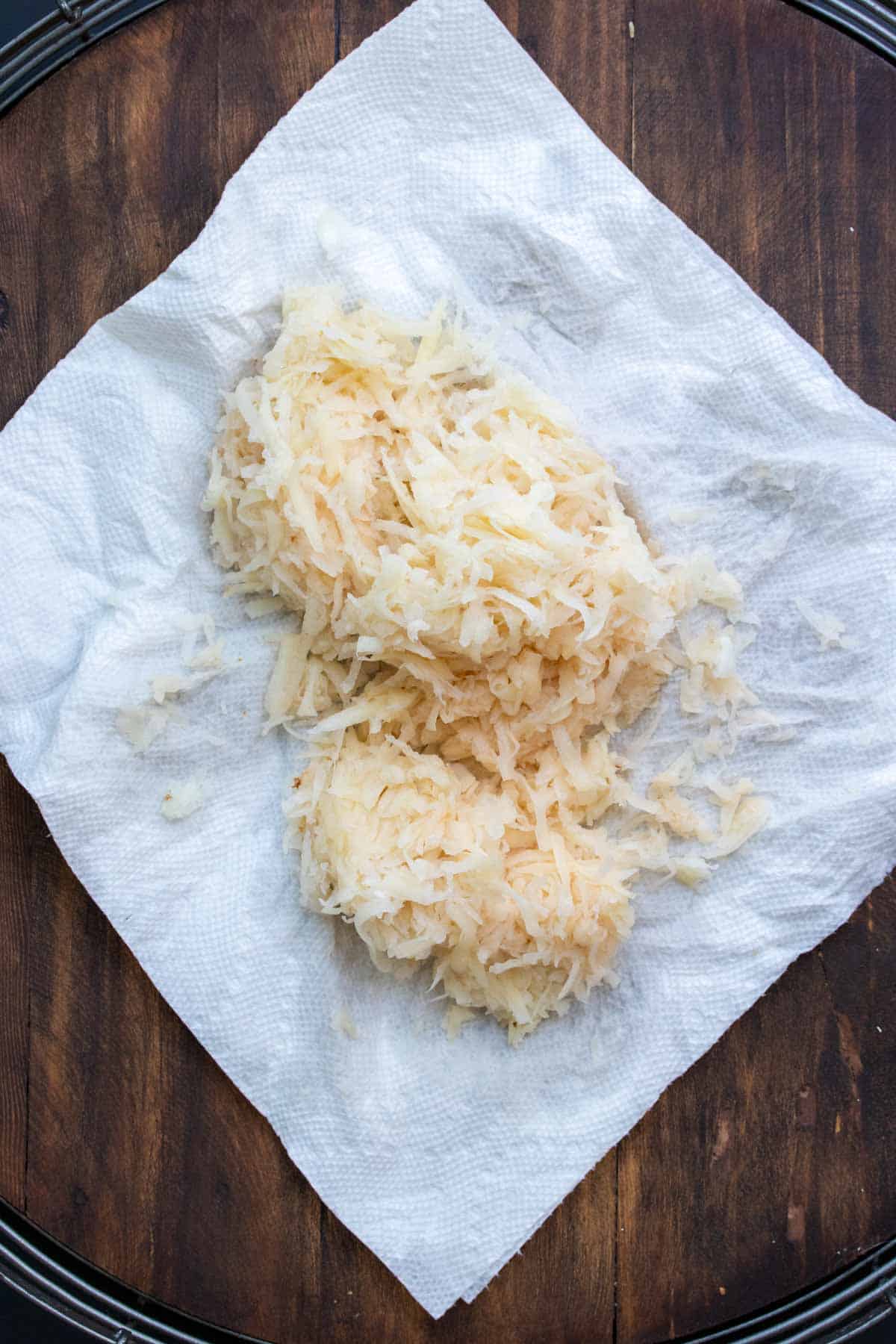 Shredded potato on a kitchen towel