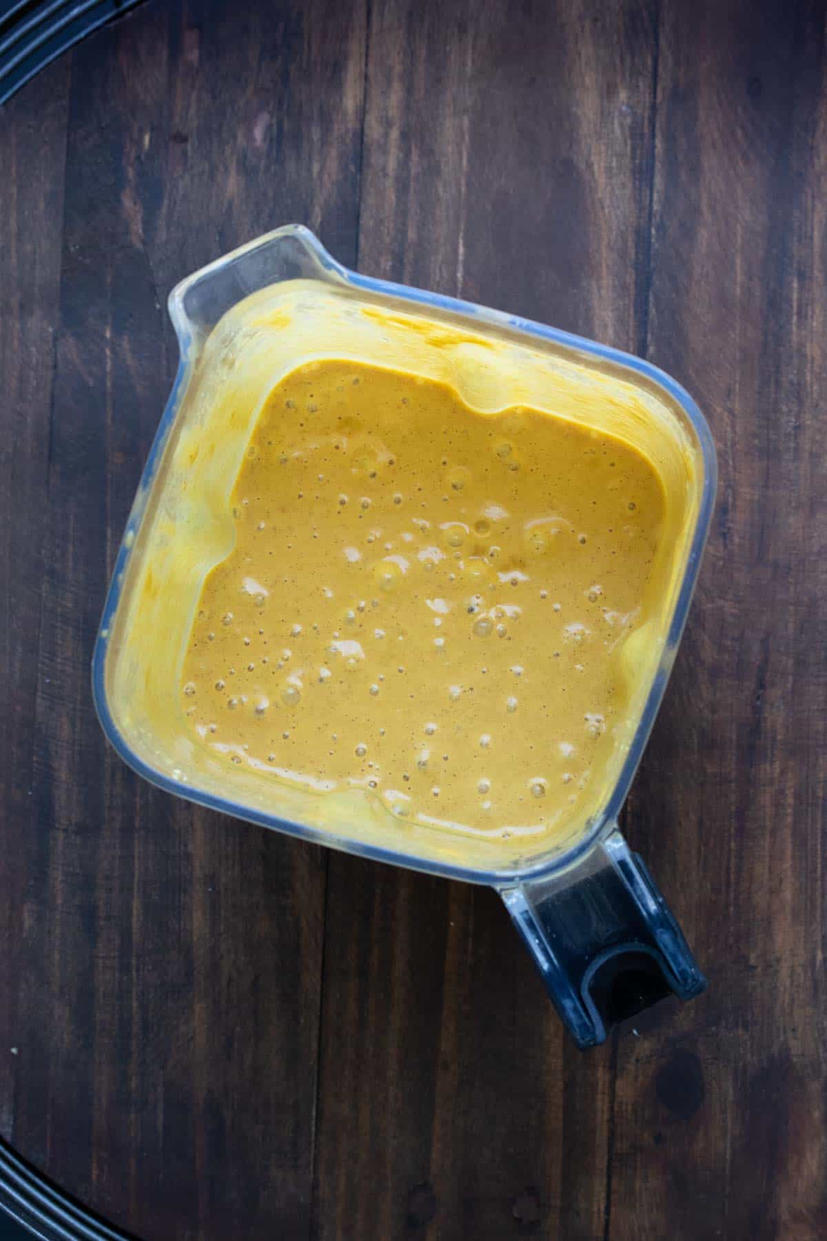 Top view of a blender filled with a pumpkin pie smoothie