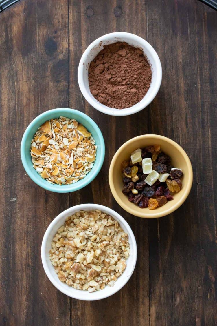 Bowls with different toppings for chocolate truffles