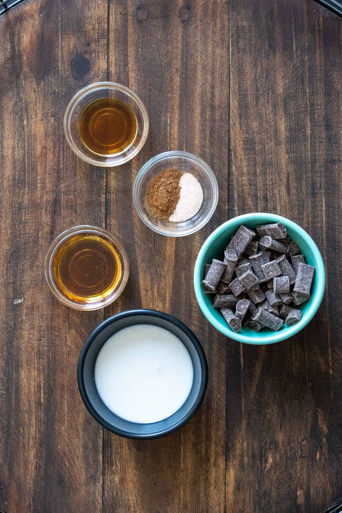 Different bowls with ingredients to make chocolate truffles.