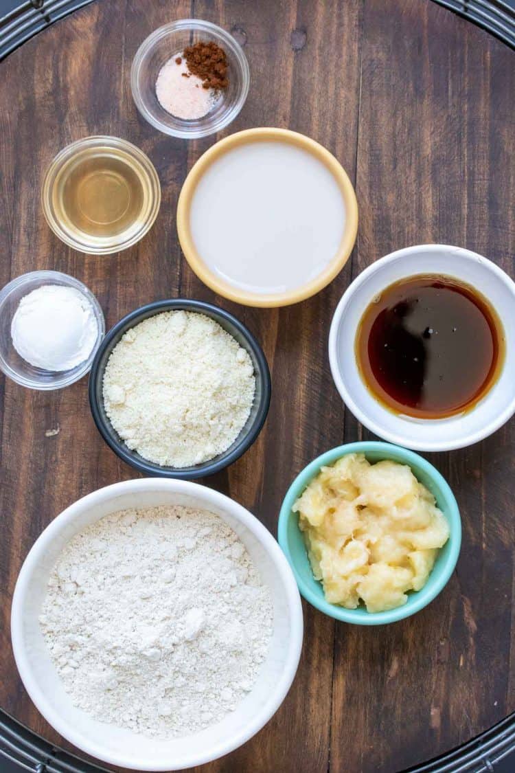 Bowls with ingredients needed to make banana oat blender muffins