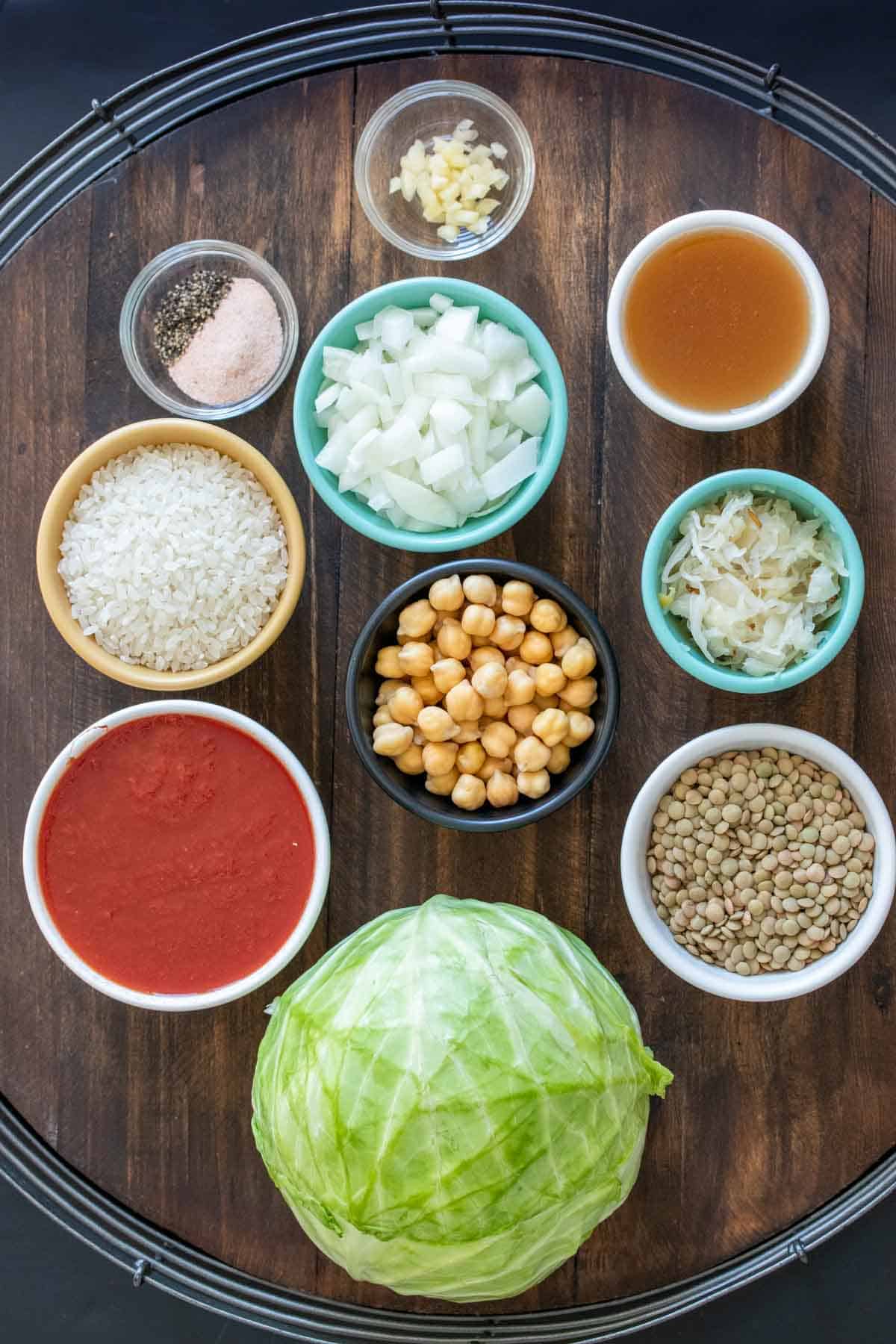 Different color and size bowls with ingredients for stuffed cabbage