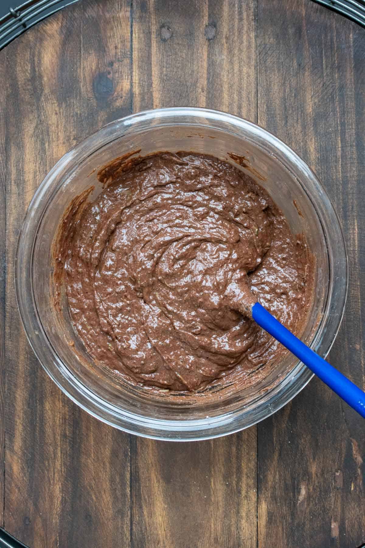 Top view of glass bowl filled with chocolate cake batter