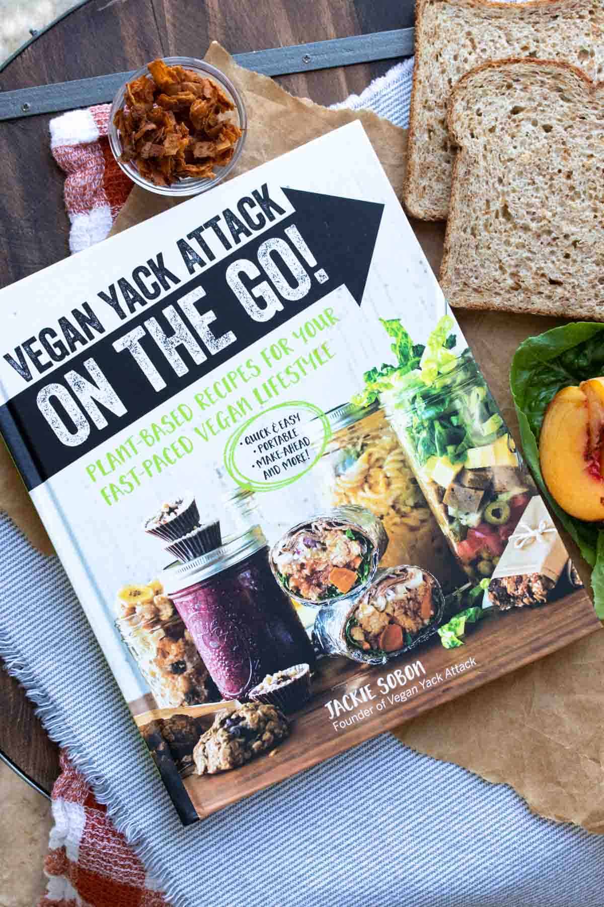 Cookbook cover with jars of food, burritos and snacks