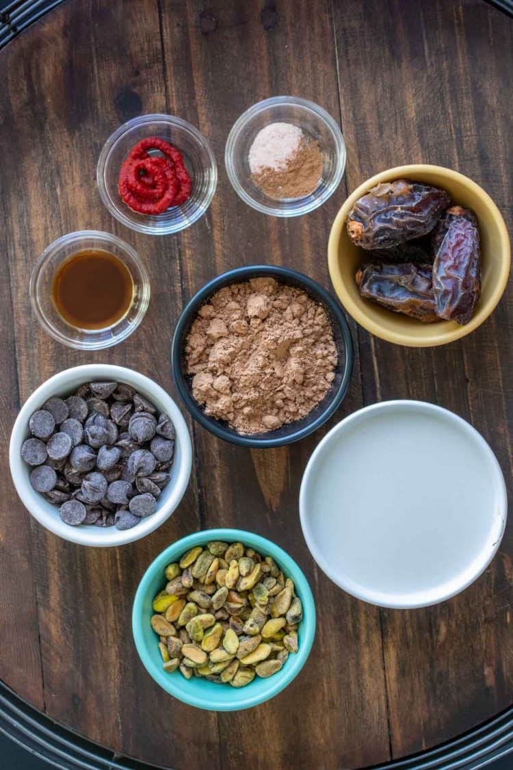 Ingredients to make a healthy dairy free version of hot chocolate in bowls