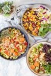 Three bowls filled with veggies mixed with different things on a kitchen towel