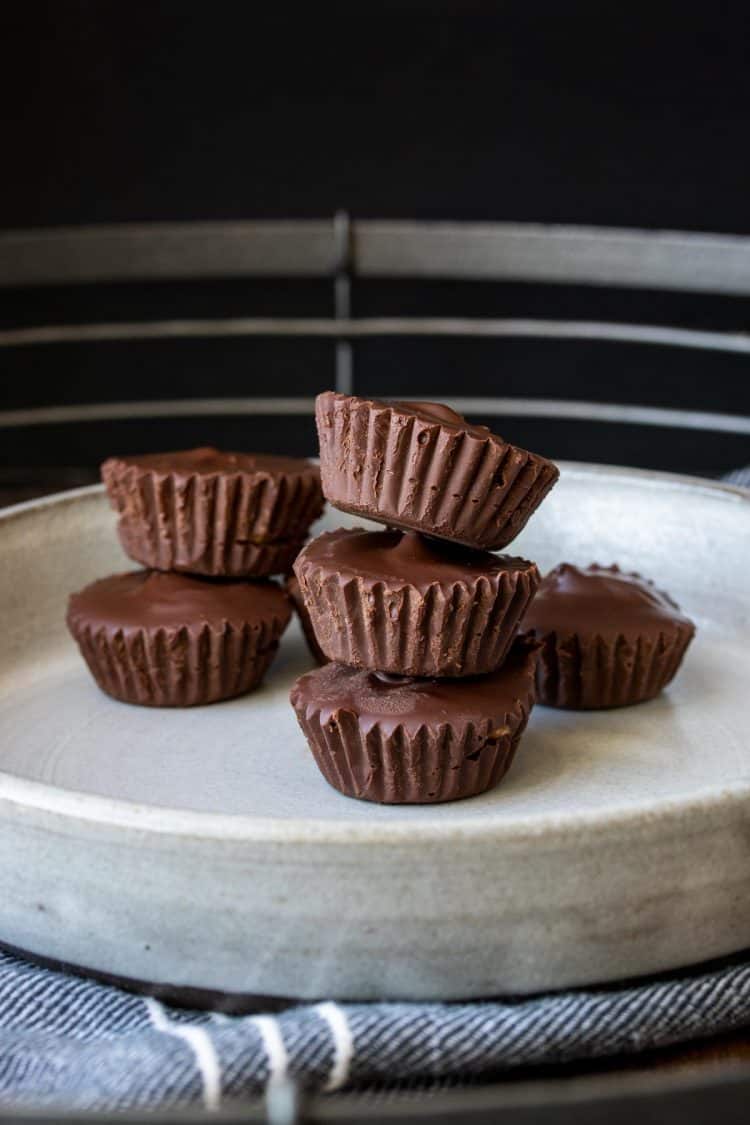 Grey plate piled up with mini peanut butter cups