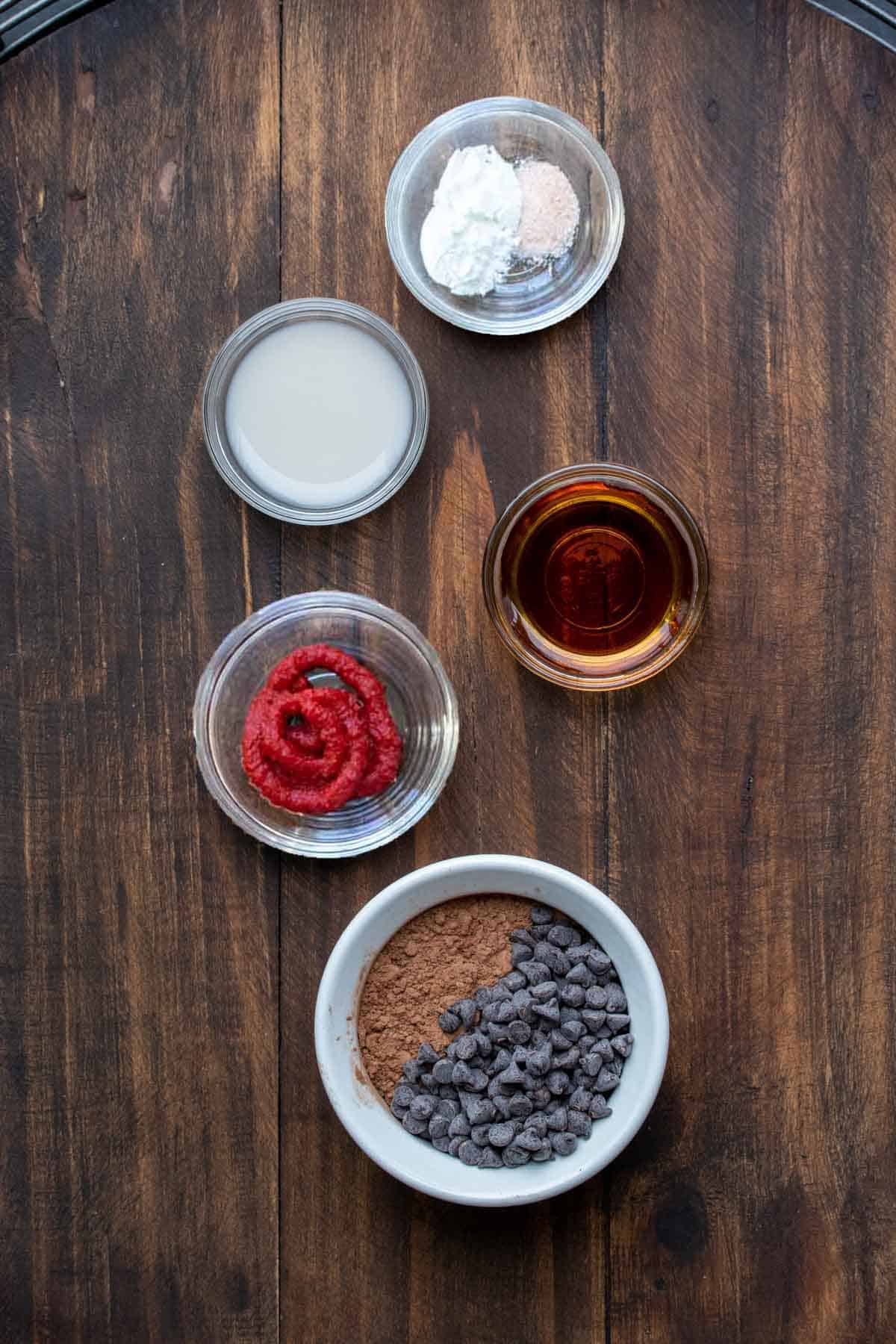 Bowls with ingredients to make a chocolate mug cake